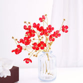 Red Blossoms in Crystal Vase
